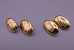 A pair of 18 ct gold cufflinks. 8.4 grammes.