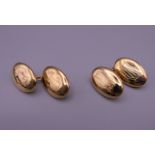 A pair of 18 ct gold cufflinks. 8.4 grammes.