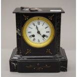 A Victorian marble mantle clock. 22 cm high.