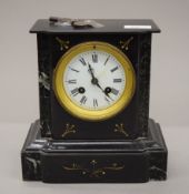 A Victorian marble mantle clock. 22 cm high.