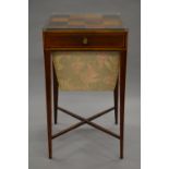 A Victorian inlaid mahogany sewing table with specimen wood inlaid top. 41.5 cm square.
