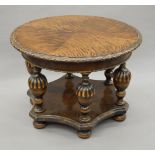 A mid-20th century carved coffee table. 80 cm diameter.