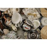 A large collection of vintage porcelain teapots.
