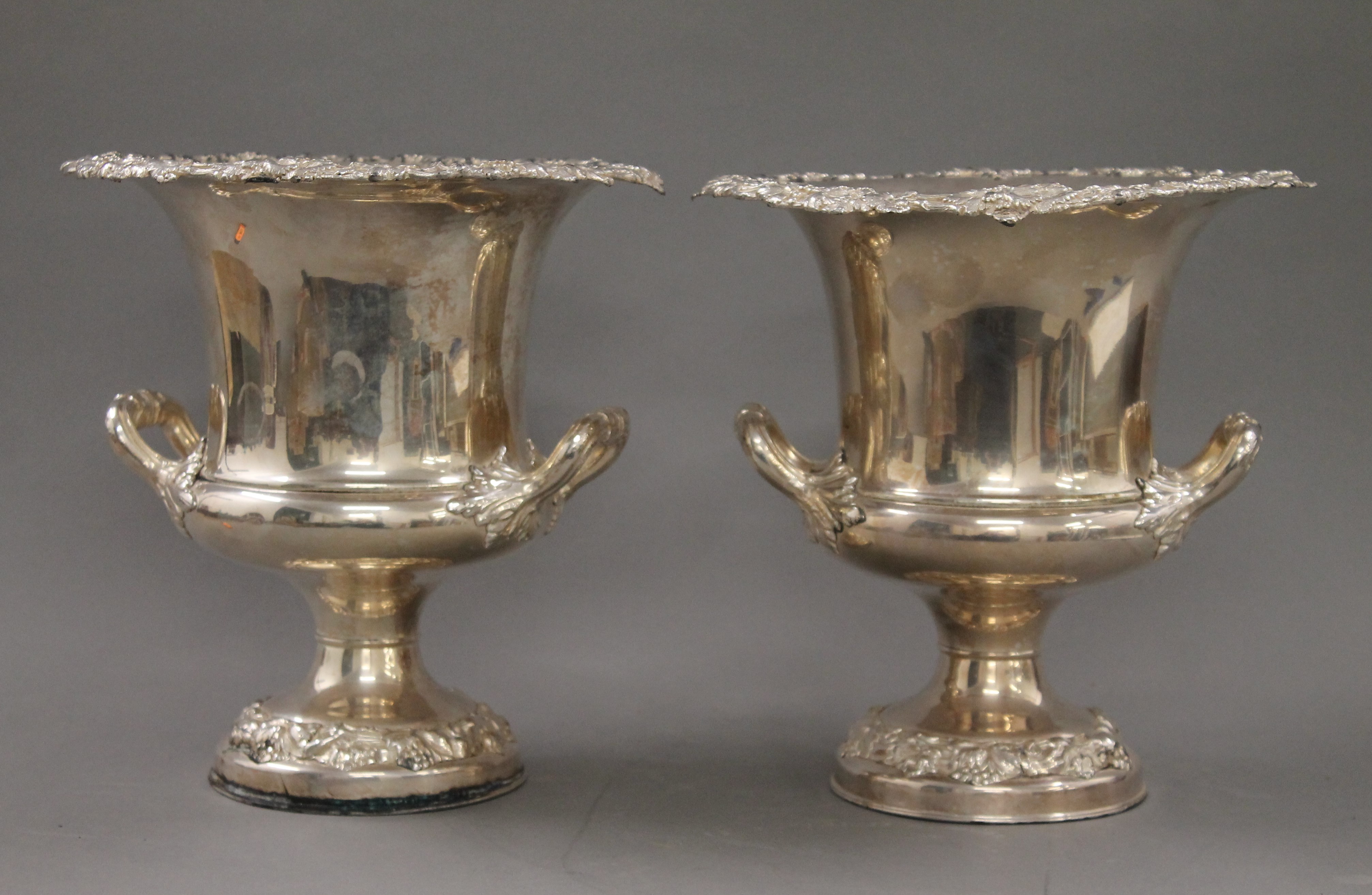 A pair of Sheffield silver plated wine coolers. 25 cm high.