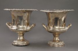 A pair of Sheffield silver plated wine coolers. 25 cm high.