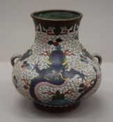 A 19th century cloisonne vase. 18 cm high.