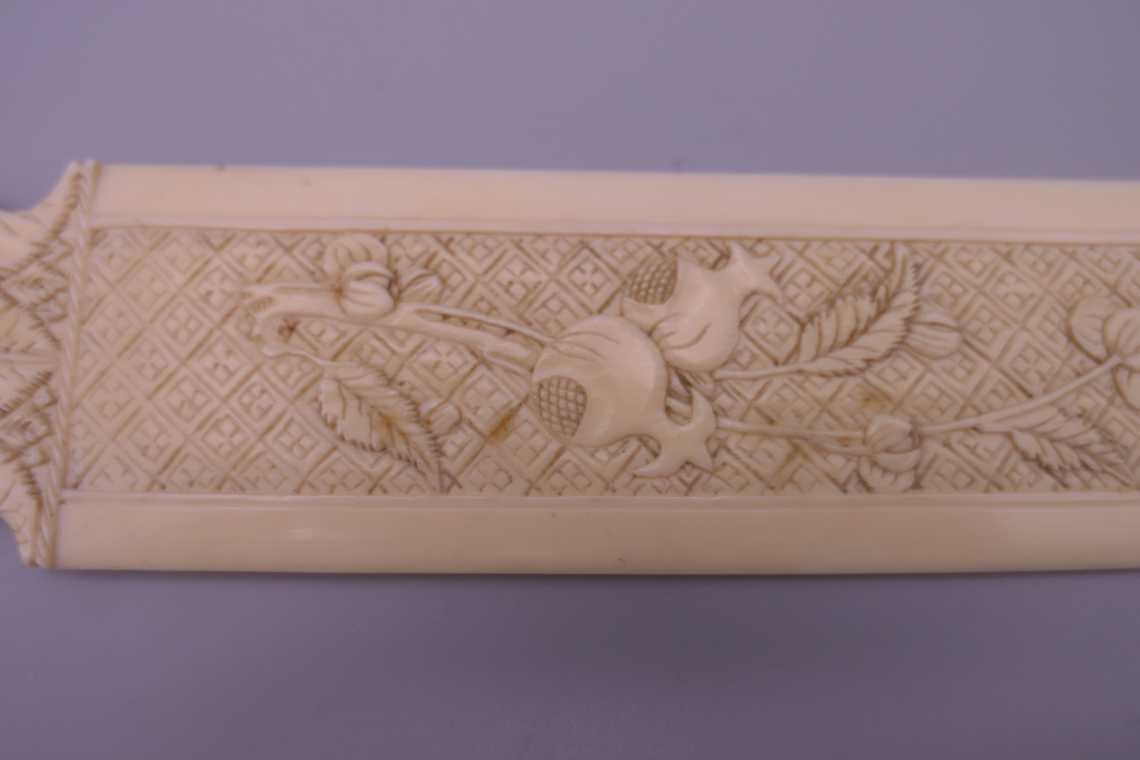 A 19th century Canton carved ivory letter opener. 32 cm long. 46.5g. - Image 4 of 10