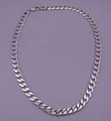 A gentleman's silver curb necklace. 52.5 cm long. 62.9 grammes.