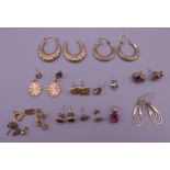 A quantity of various gold and other earrings. 13.7 grammes total weight.