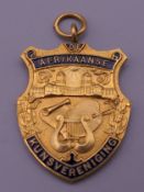 A 9 ct gold and enamel Afrikaanse fob. 8.9g.