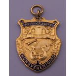 A 9 ct gold and enamel Afrikaanse fob. 8.9g.