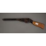 A vintage pop gun. 61 cm long.