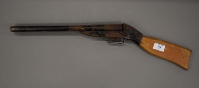 A vintage pop gun. 61 cm long.