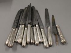 A quantity of 19th century silver handled knives.
