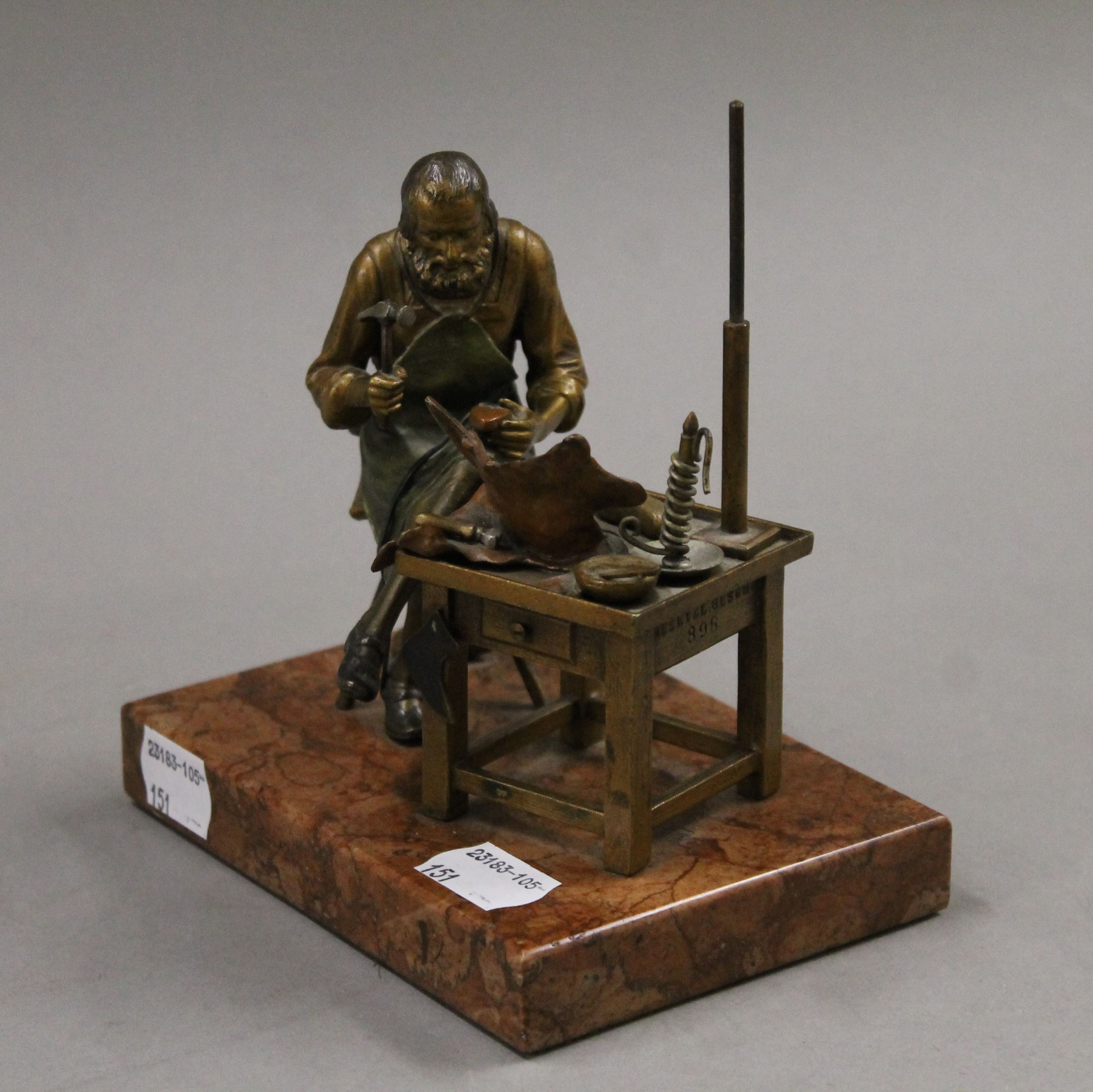 A cold painted bronze model of a cobbler mounted on a rouge marble base. 13.5 cm wide. - Image 2 of 6