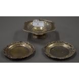 Two small silver pin trays and a small silver bon-bon dish. The latter 11.5 cm wide. 122.9 grammes.