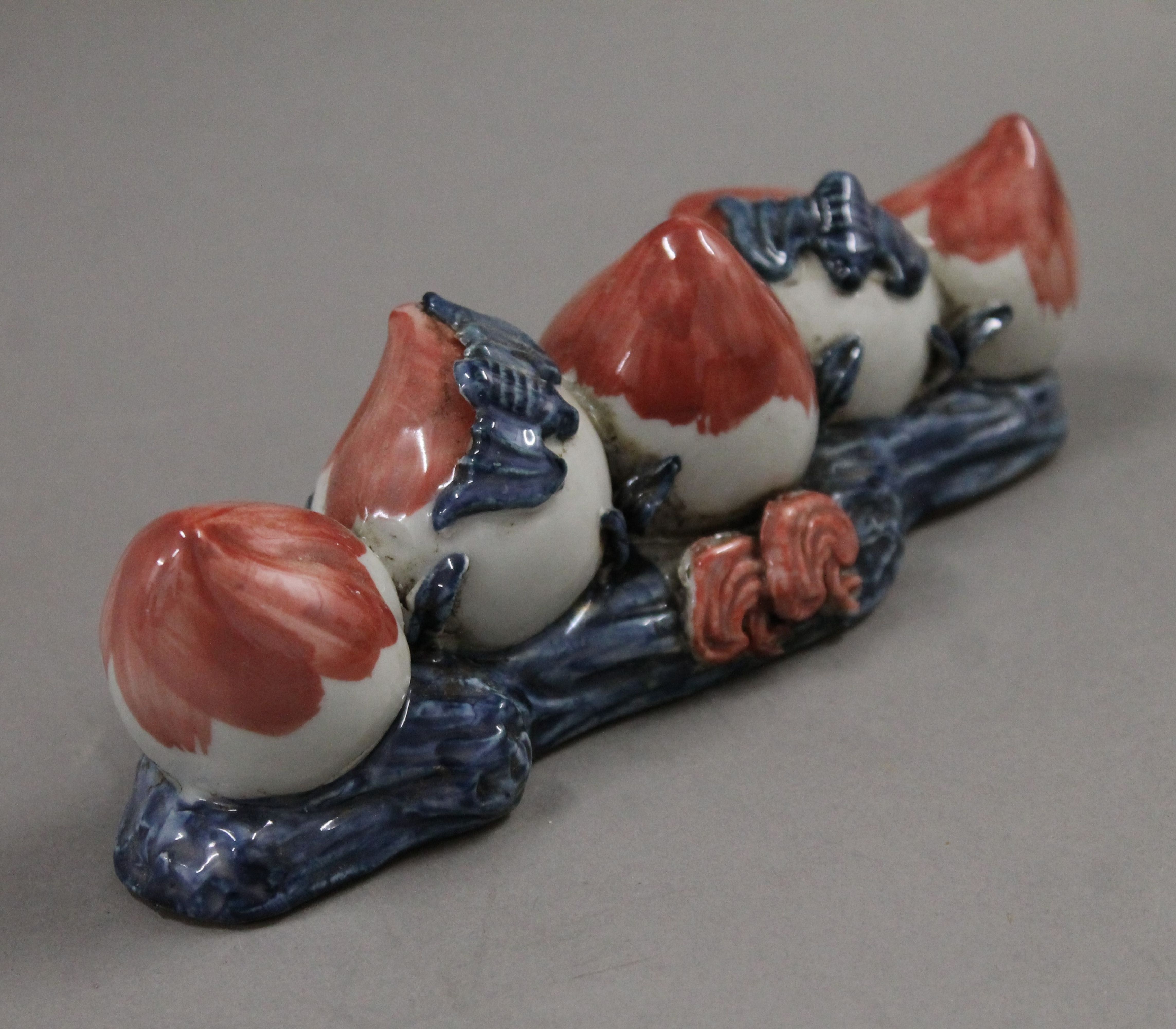 A Chinese porcelain peach form brush rest. 21 cm long. - Image 2 of 3