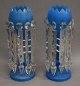 A pair of Victorian blue glass lustres. 35 cm high.