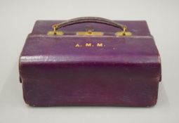 A Victorian leather ladies travelling case. 25 cm wide.