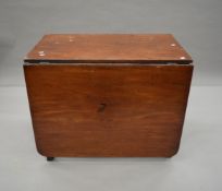 A 19th century mahogany drop leaf table. 90.5 cm long.