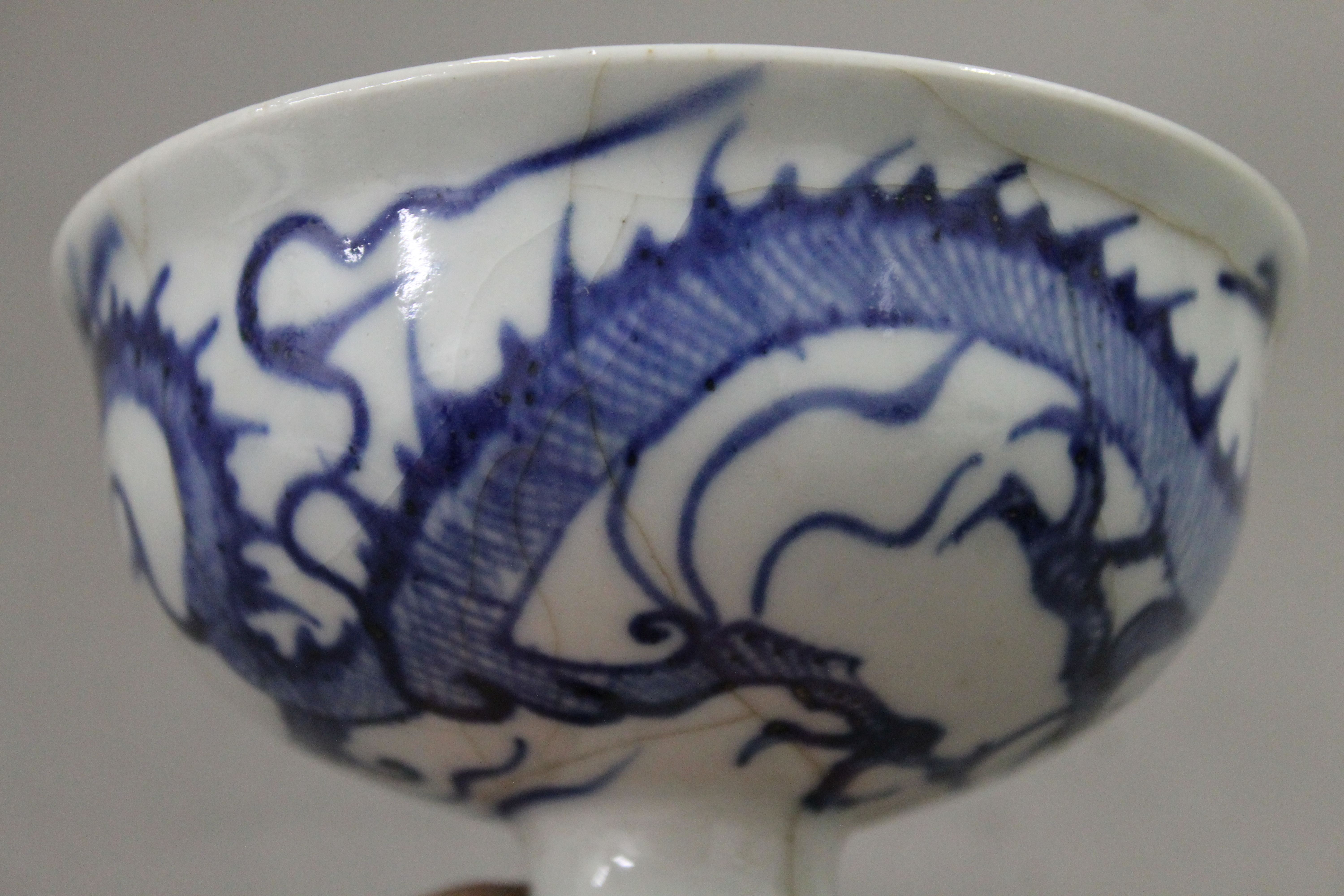 A Chinese blue and white porcelain stem cup. 11 cm high. - Image 3 of 6
