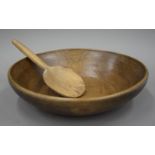 A 19th century dairy bowl and spoon. The former 35.5 cm wide.