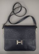 A Vera Pelle blue leather handbag. 28 cm wide.