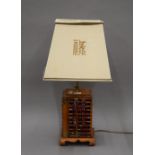 A Chinese table lamp. 66 cm high overall.