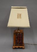 A Chinese table lamp. 66 cm high overall.