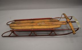 A vintage Flexible Flyer sledge. 150 cm long.