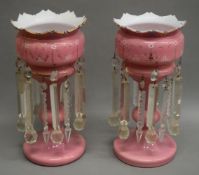 A pair of Victorian pink glass lustres. 37 cm high.