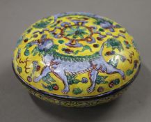 A Canton yellow enamel box. 11 cm diameter.