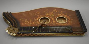 An early 19th century John Werro zither. 63 cm long.