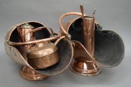 A quantity of copper ware, including two coal scuttles.