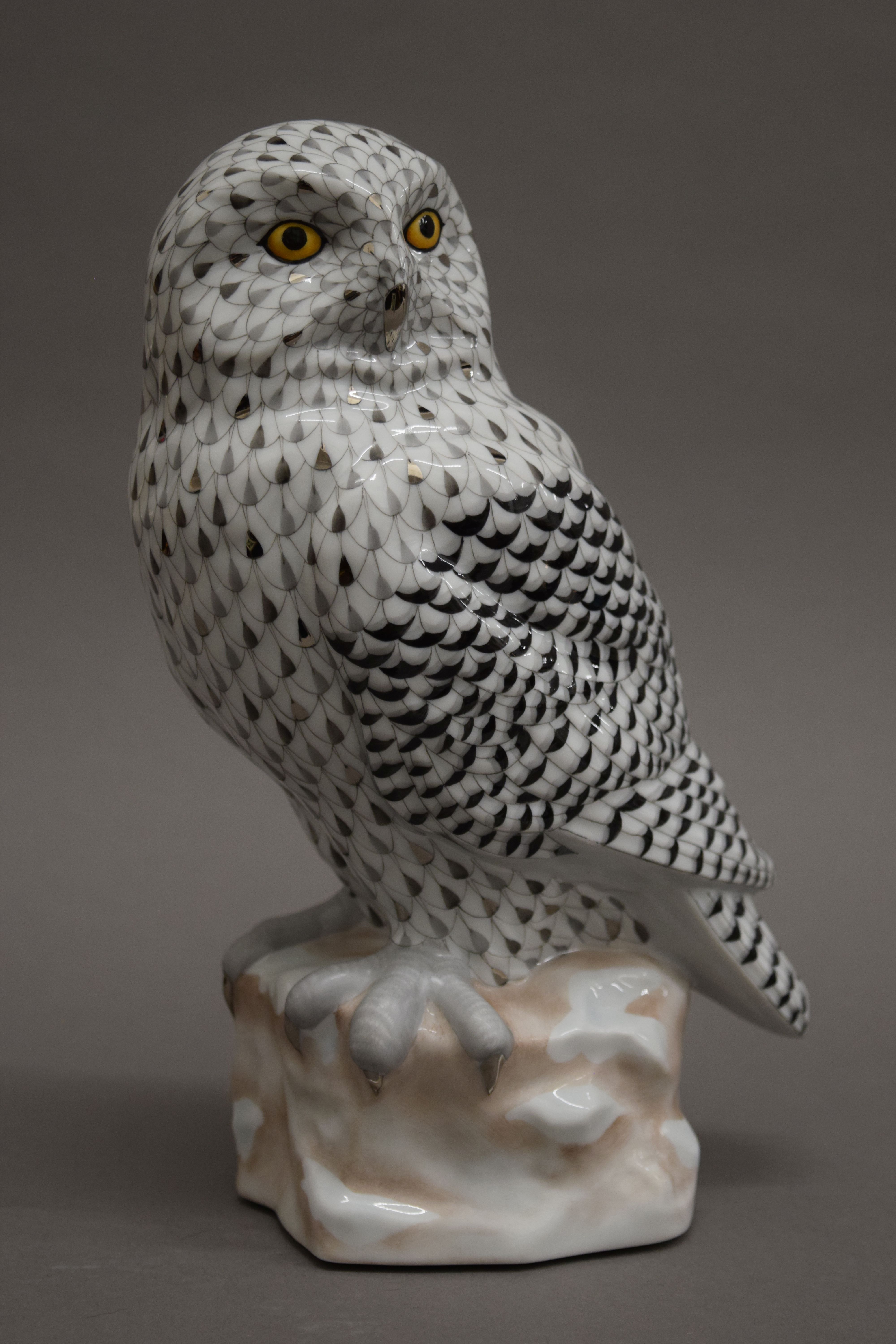 A Herend porcelain model of an owl. 24 cm high.