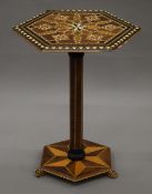 A Moorish side table. 38 cm wide.