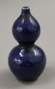 A small Chinese blue porcelain double gourd vase. 11 cm high.