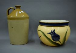 A two gallon Victorian stoneware flagon and a vase.