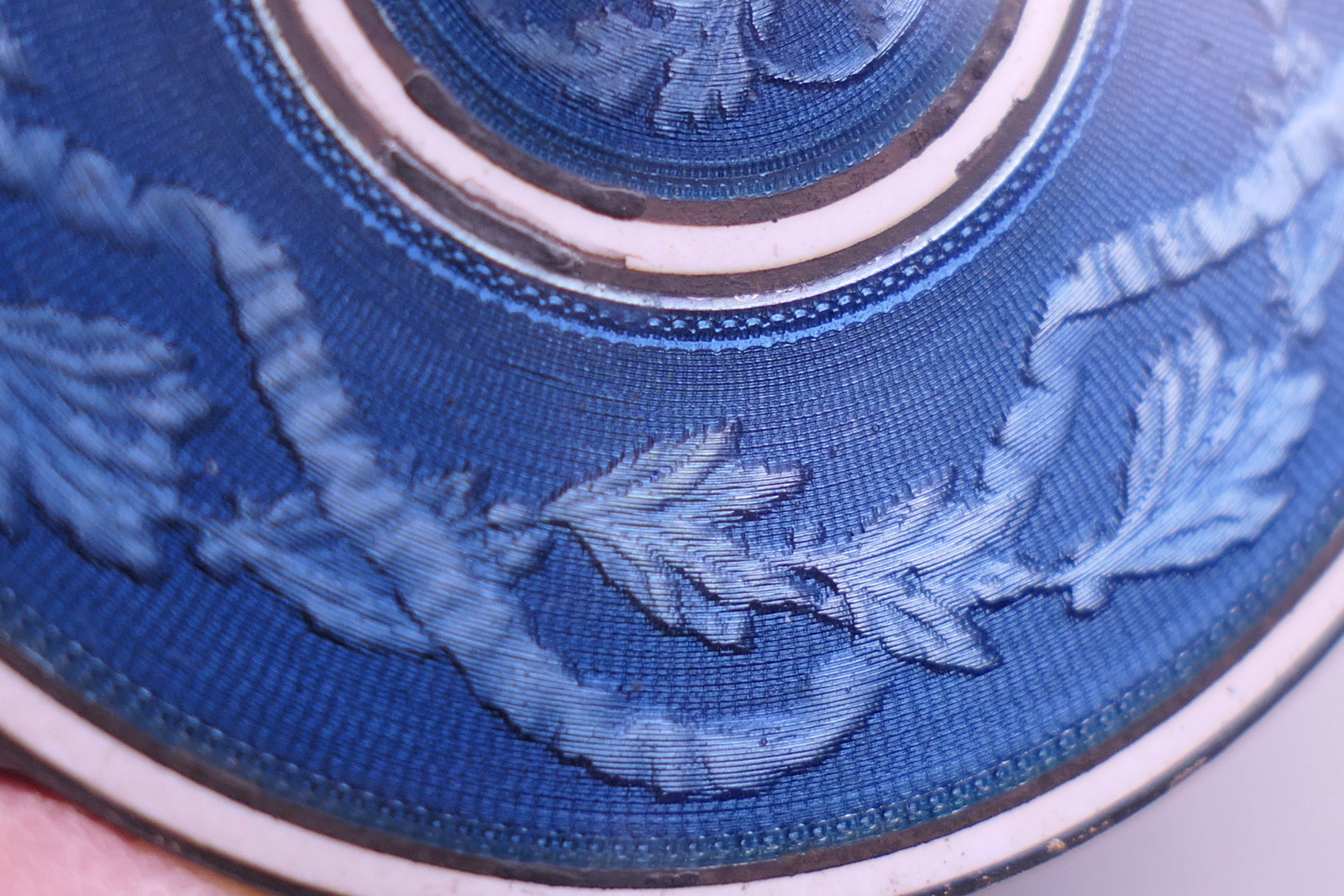 A Continental blue enamel decorated silver box. 4.5 cm diameter. - Image 6 of 9
