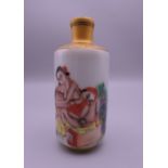 A Chinese porcelain erotic snuff bottle. 8.5 cm high.