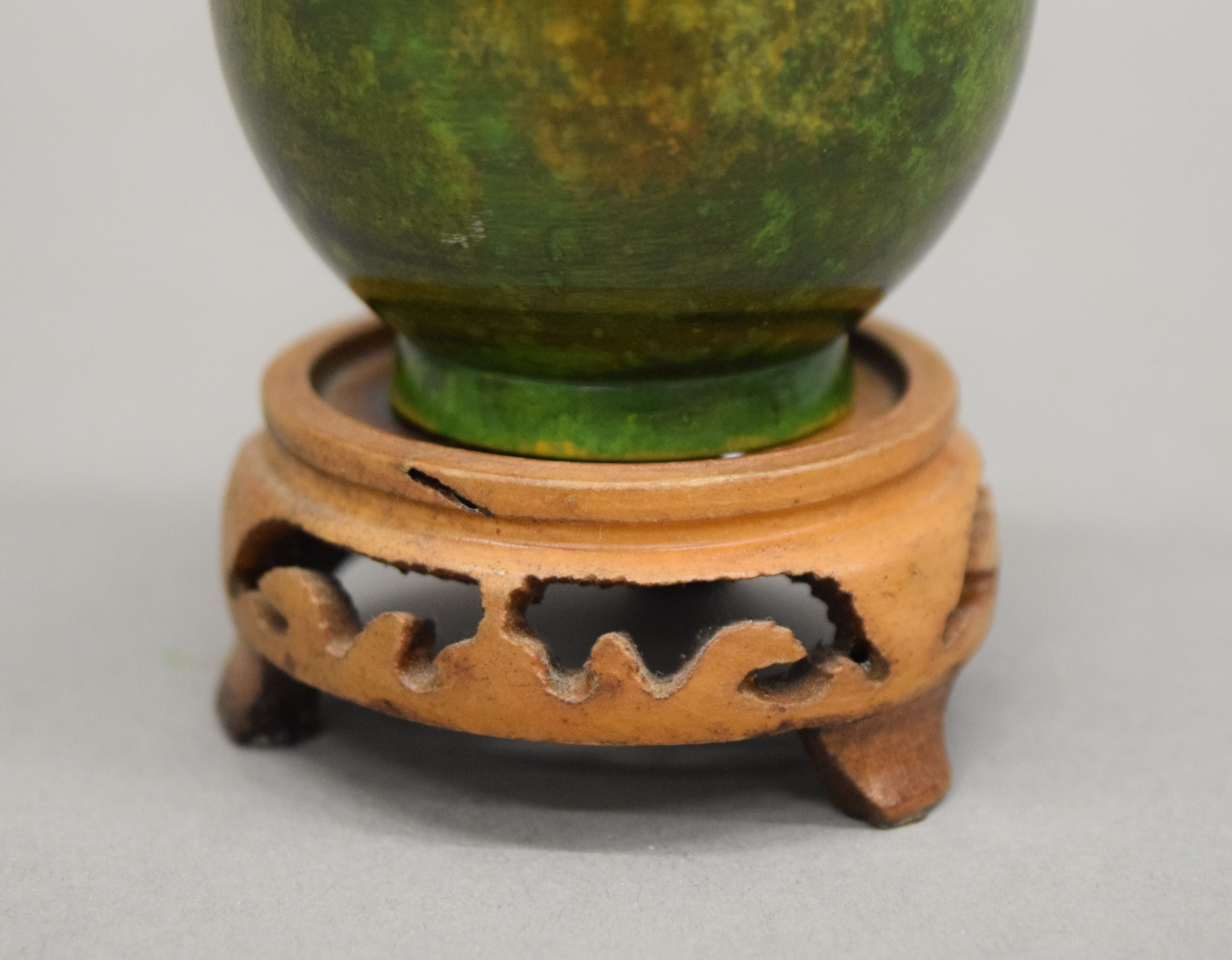 A small Japanese patinated bottle vase on a carved stand. 19 cm high overall. - Image 4 of 4