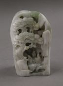 A Chinese white jade carved boulder. 16 cm high.