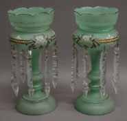 A pair of Victorian painted green glass lustres. 31.5 cm high.