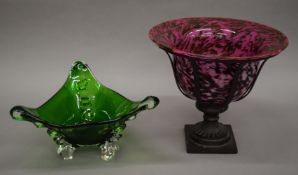 Two Art glass bowls. The largest housed on a metal stand 27 cm high.