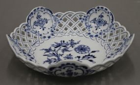 A Meissen reticulated porcelain blue and white bowl. 22 cm diameter.