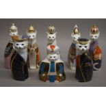 Eight Royal Crown Derby Royal cat paperweights. The largest 22 cm high.