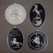 Four National Horse Show plaques. The largest each 21.5 cm high.