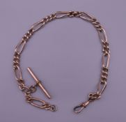 An antique rolled gold watch chain. 28 cm long.