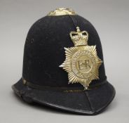 A Metropolitan police helmet.