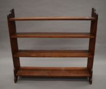 A Victorian mahogany bookcase. 113.5 cm wide.